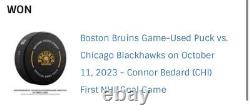 Connor Bedard GAME USED First NHL Goal Puck Bruins v. Blackhawks October 11